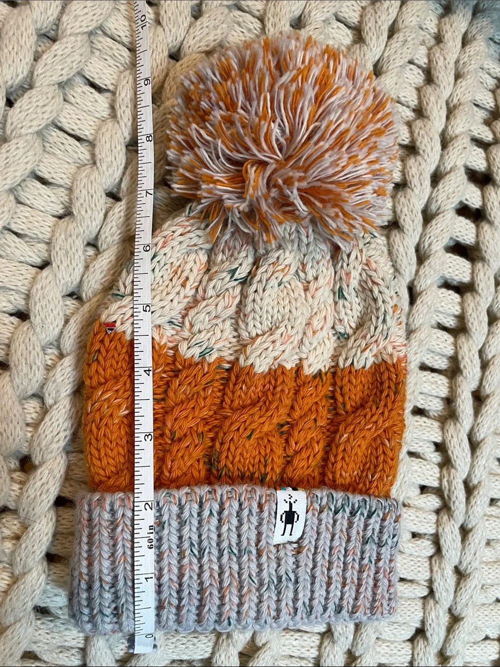 Smartwool Kids Isto Retro Cable Knit Pom Beanie in Orange and Cream and Gray